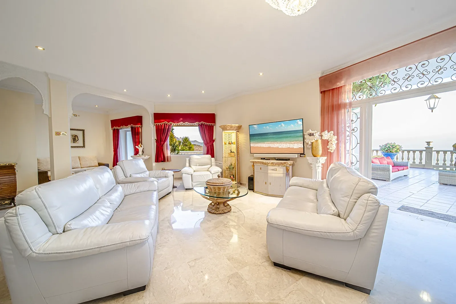 Main villa living room with terrace access